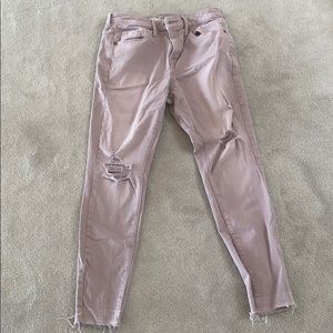 Pink distressed skinny jeans